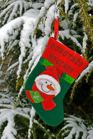 Christmas Stocking On Snowy Tree / 100623