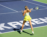 Woman Playing Tennis / 100396